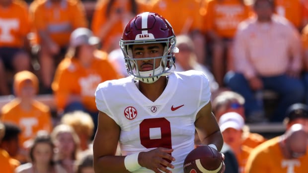 Alabama quarterback Bryce Young warms up before a game.